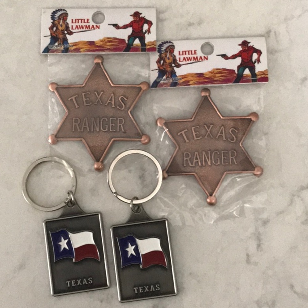 Texas gifts: two keychains, and two Texas Ranger pins